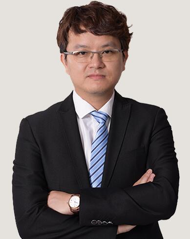 何煒華